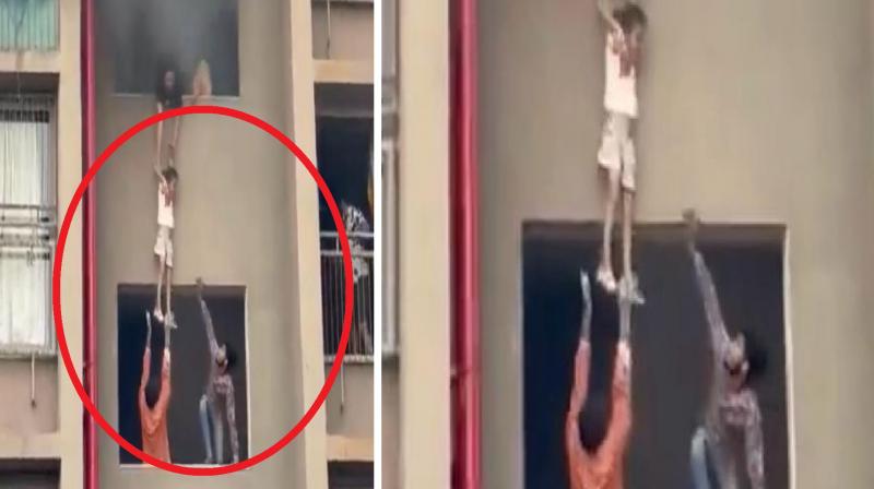 Video of rescuing children from a burning building in Ahmedabad goes viral news in hindi
