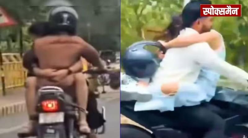 Couple seen recreating romantic scene on a moving bike; Girlfriend sat on fuel tank hugging boyfriend, news in hindi 