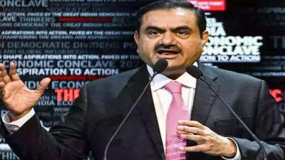 Shares of seven Adani group companies declined